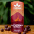 Image of pink-ish tube of dark chocolate macadamias