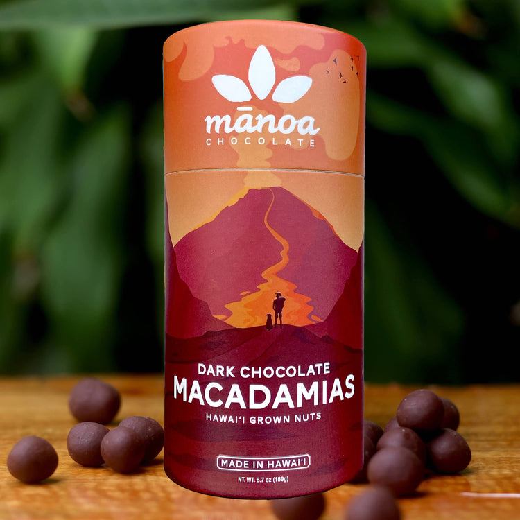 Image of pink-ish tube of dark chocolate macadamias