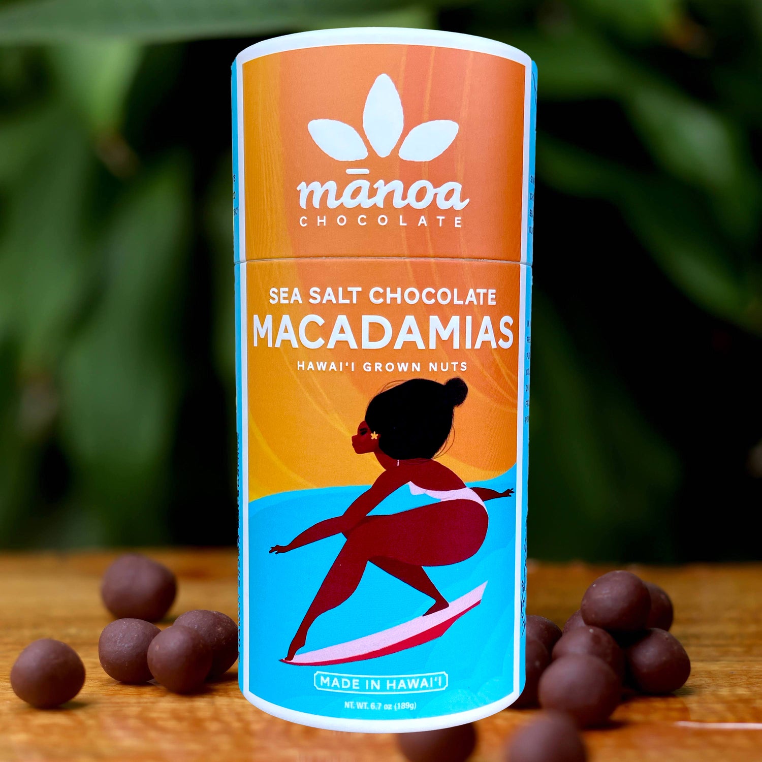 Image of blue and orange tube of sea salt chocolate macadamia nuts