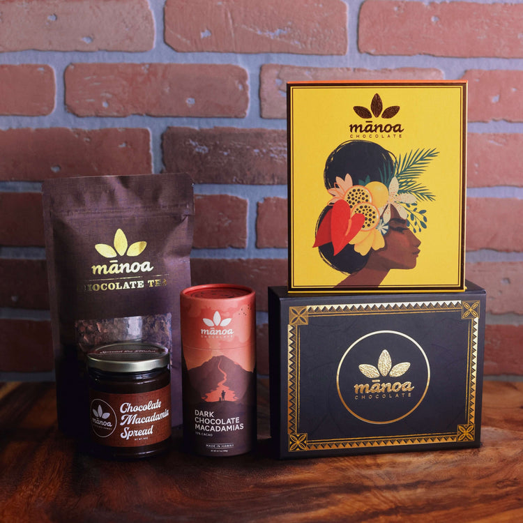 Bag of chocolate tea, jar of chocolate macadamia spread, tube of dark chocolate macadamias and two boxes of chocolate