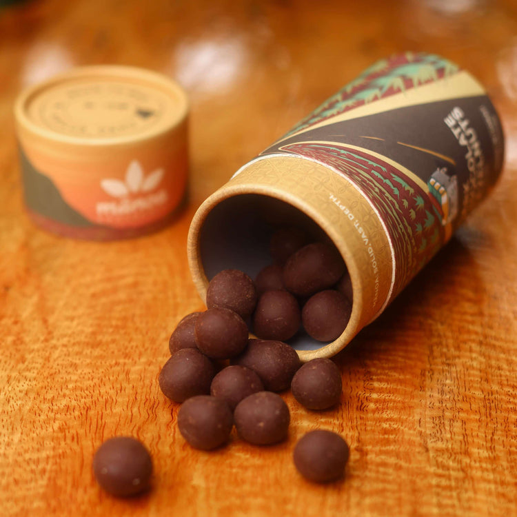Dark chocolate hazelnuts on table