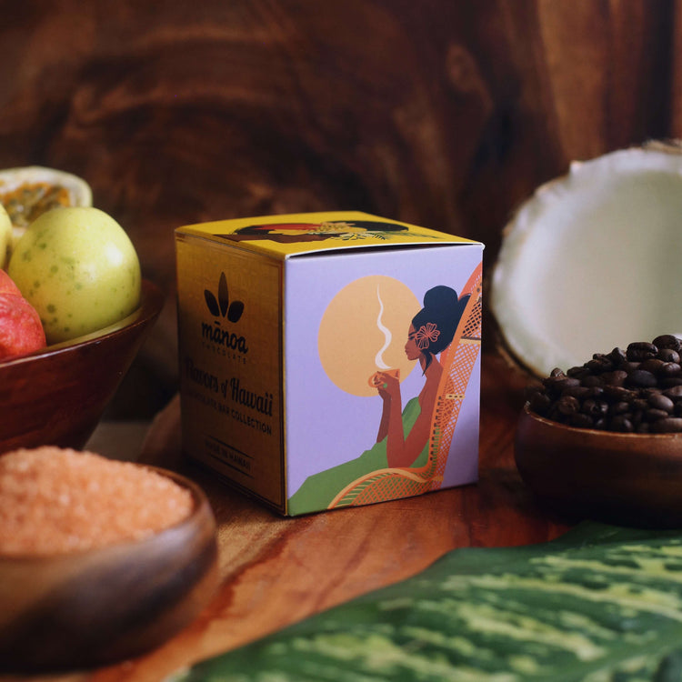 Image of the side of the cube-shaped box, with artwork of woman drinking coffee over light purple background