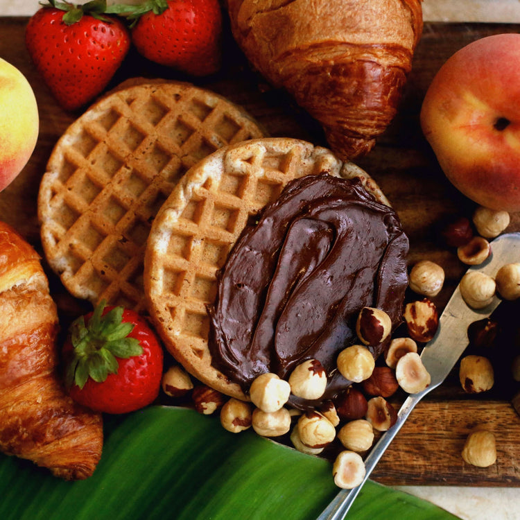 Image of dark chocolate hazelnut spread on waffle