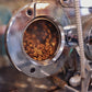 Coffee beans inside of a coffee roaster