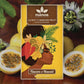 Image of Lilikoi passion fruit bar, in bright yellow packaging, sitting among sliced passion fruits
