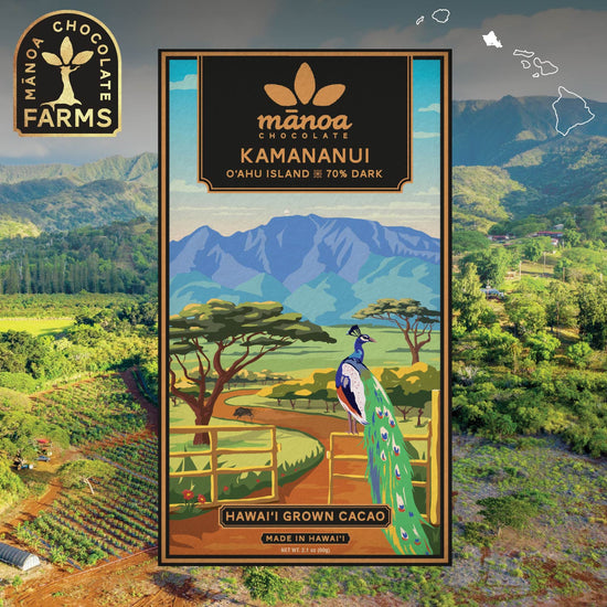 Image of Kamananui 70% dark chocolate package, featuring mountains, orchards, and a peacock