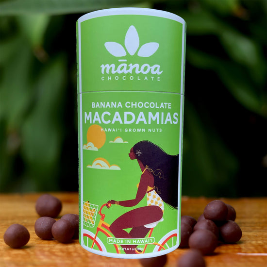 Image of brightly-colored, green tube that says Banana Chocolate Macadamias. Made in Hawaii with Hawaii grown nuts