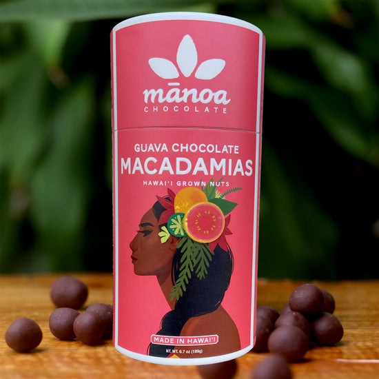 Image of brightly-colored, pink tube that says Guava Chocolate Macadamias. Made in Hawaii with Hawaii grown nuts