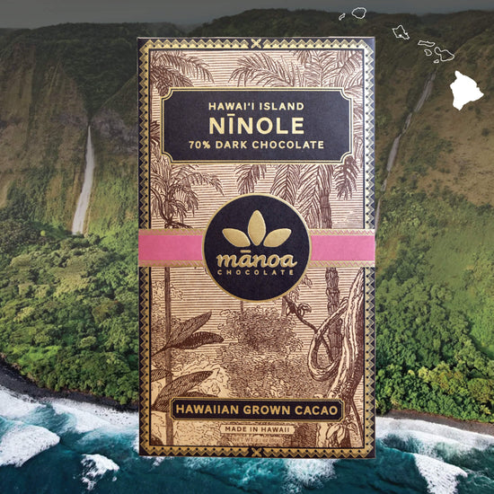 Image of Ninole bar in brown, natural-looking packaging, with cliffs and ocean in the background