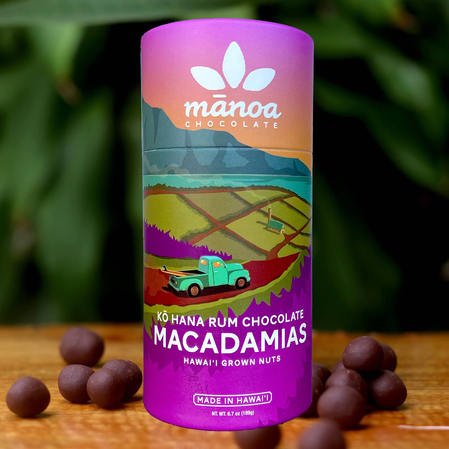 Image of purple tube of Kohana rum chocolate macadamias