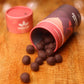 Dark chocolate macadamia nuts on table