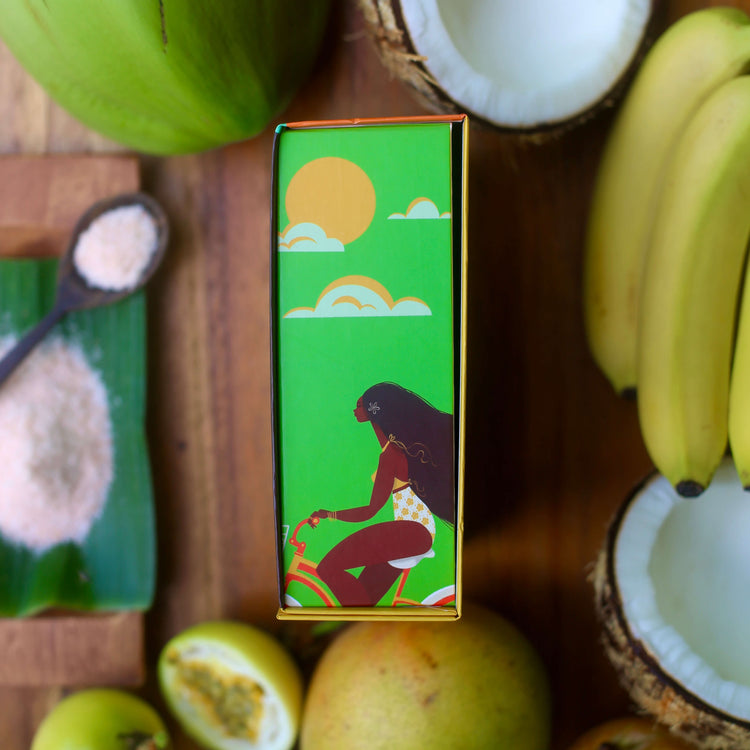 Image of the side of the brightly-colored gift box, with biking girl artwork
