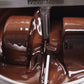 Image of liquid chocolate in industrial machine